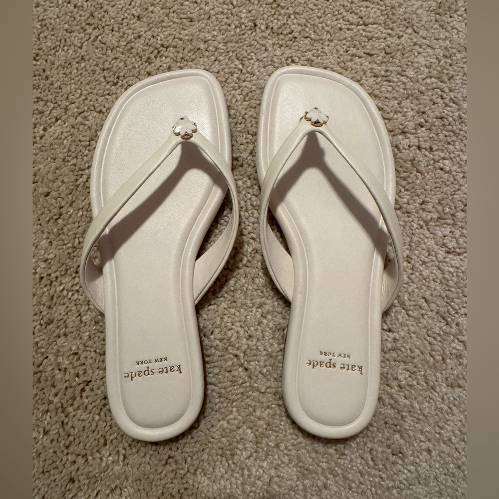 kate spade cream Square-Toe Thong Sandals with Logo Charm